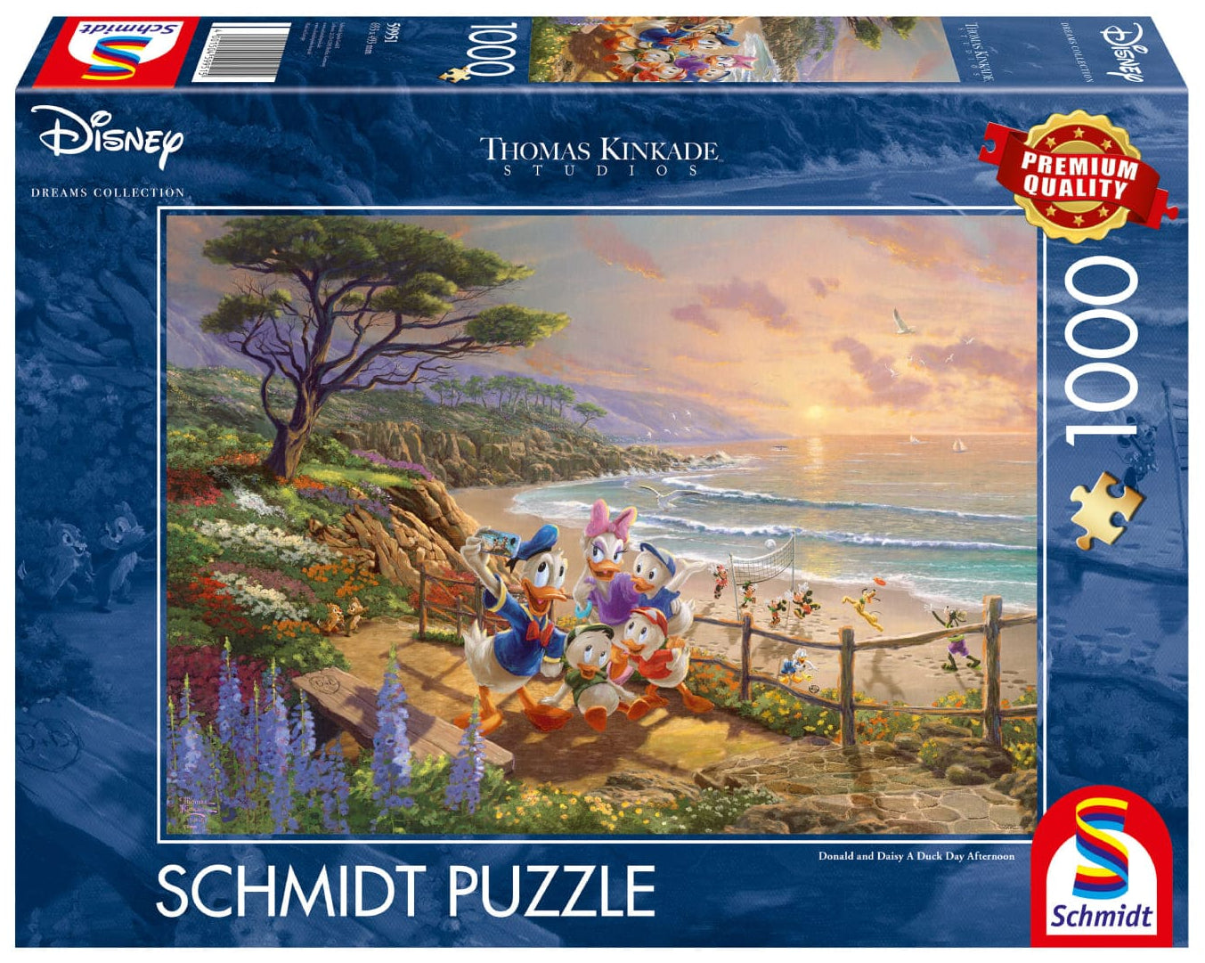 Schmidt puzzle box featuring Disney and Thomas Kinkade artwork with a scenic beach scene.