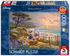 Schmidt puzzle box featuring Disney and Thomas Kinkade artwork with a scenic beach scene.